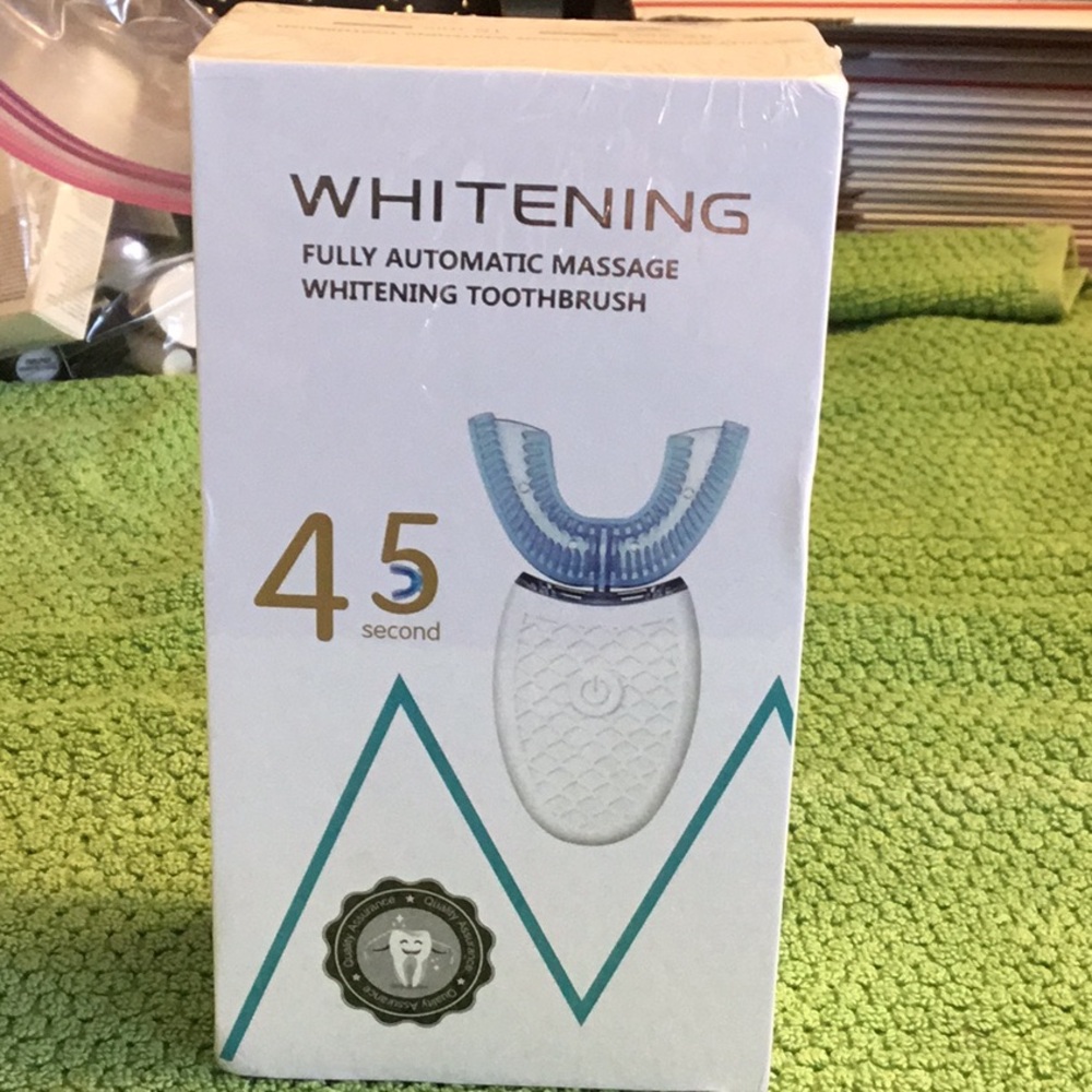 NIB Automatic Whitening Toothbrush